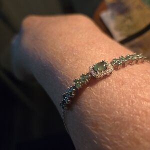 Elegant Silver Bracelet with Green Gemstones